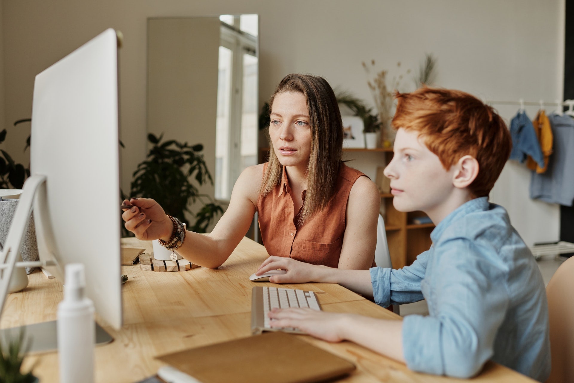 Boy Learning Online with Mom